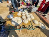 العيش الشمسي على الطريقة الواحاتية فى مهرجان الوادي الجديد للرياضات التراثية.. فيديو