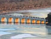 أضواء ذهبية مبهرة.. جسر الأقواس الساحرة فى بكين