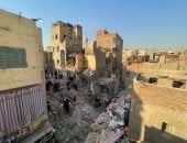 الحماية المدنية تحاصر ركام عقار إمبابة المنهار بحثًا عن المفقودين.. صور