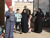 إقبال متزايد على لجان إعادة انتخابات مجلس النواب فى العياط.. صور