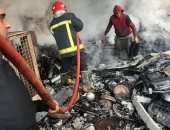 السيطرة على حريق مخزنى خردة فى بولاق أبو العلا دون إصابات.. صور