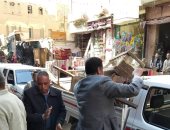 حملة مكبرة لرفع الاشغالات بشارع الثورة بمركز طما فى سوهاج