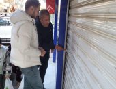 غلق 36 محلا ورفع 154 إشغالا وتعديا على الأرصفة فى حملات بأحياء القاهرة الكبرى