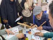 مدرسة خضير البورسعيدى للخط والزخرفة تشارك بجناح صندوق التنمية بمعرض الكتاب