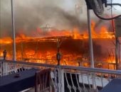 النيابة تعاين حريق مركب سياحى بكورنيش أسوان.. صور
