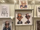 الكاريكاتير العالمى يحتفى بنجيب محفوظ