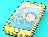 خطر الجرائم الإلكترونية على الأطفال فى كاريكاتير اليوم السابع