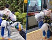 بطل من طراز خاص.. طالب صينى يبهر الملايين بطريقة ترتيب وحمل أمتعته المكدسة