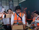 حياة كريمة: موظفو البنك المركزي يشاركون فى تجهيز كراتين رمضان.. صور