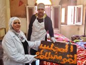 القومى للمرأة بأسوان يوزع 700 وجبة غذائية فى قرى كوم أمبو.. صور