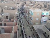 مشهد مصغر لإفطار المطرية.. أكثر من 2000 صائم على أطول مائدة بنقادة بقنا.. صور