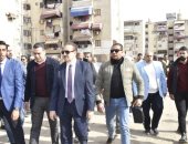 أعمال تطوير ورفع كفاءة 168 عمارة بحى الزهور فى بورسعيد.. صور