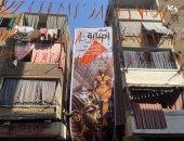 إفطار إمبابة.. بانر ضخم للمتحف المصرى الكبير قبل مائدة الإفطار الجماعية