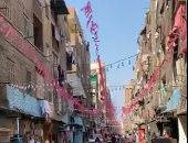 أهالي إمبابة يستقبلون الصائمين بالطبل البلدي والبلايين