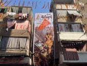 أهالى إمبابة عيلة واحدة.. الشباب يجهزون مائدة بطول 43 شارعًا.. شارع الاعتماد يتحول إلى متحف مفتوح.. تماثيل فرعونية ومجسم للكعبة وفانوس بطول 10 أمتار.. والألعاب النارية والأجواء الكرنفالية تخطف الأنظار.. صور