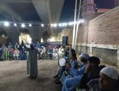 لعبة العصا والمزمار البلدي في ليلة رمضانية بأسوان.. فيديو وصور