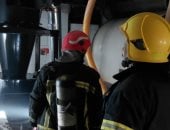 السيطرة على حريق لإنتاج البن فى مدينة بدر دون إصابات.. صور