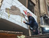 بالسبحة والصليب وعلم فلسطين.. فيصل ترسم ملحمة حب فى أكبر إفطار جماعى غدا