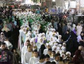 زغاريد وتكبيرات تملأ الشوارع.. أهالى سقارة ينظمون ممرًا شرفيًا لحفظة القرآن