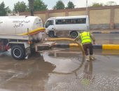 هيئة النظافة بالجيزة تدفع بمعداتها لشفط مياه الأمطار وتيسير الحركة المرورية
