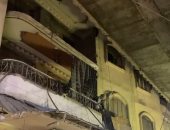 الانتهاء من انزال أتوبيس معلق بالطريق الدائرى بمنطقة أحمد عرابي