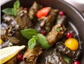 طريقة عمل طاجن ورق العنب بالكوارع.. مثالى للأيام الباردة