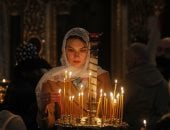 كنائس أوكرانيا تتزين بالشموع احتفالا بأحد السعف  