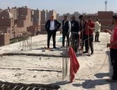 إزالة أدوار مخالفة خلال حملة بمنطقة أرض اللواء فى حى العجوزة