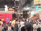 السيطرة على حريق اشتعل بمخزن وواجهة محل كشرى فى الحوامدية.. صور