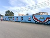 رسام يحكى تاريخ مدينة بيلا فى كفر الشيخ ويبرز شخصياتها بجداريات متعددة.. صور