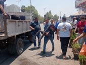 إزالة إشغالات المقاهى والمحلات خلال حملات مكثفة بحى العجوزة.. صور