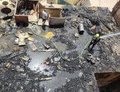 السيطرة على حريق مخلفات أخشاب أعلى سطح عقار فى البساتين.. صور