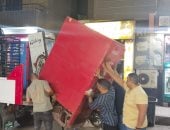إزالة إشغالات وحواجز مخالفة فى حملة ليلية موسعة بشوارع العجوزة.. صور
