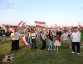 الجماهير ترفع أعلام مصر باحتفالية Egyptian Fan Zone في العاصمة الجديدة.. صور 