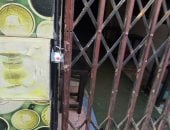 تشميع 3 أنشطة تجارية غير مرخصة خلال حملة مكبرة بحى العجوزة.. صور