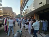 حملة مكبرة بشارع ضياء فى الطالبية لرفع تعديات الباعة على الطريق العام.. صور