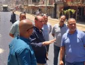 حملات مكثفة فى بولاق الدكرور لرفع كفاءة الطرق وتحسين النظافة.. صور