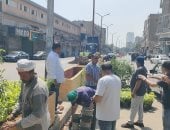 رفع كفاءة شارع العامل الأول بإمبابة بعد إخلائه من الإشغالات والتعديات