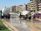 شوكولاتة على الأسفلت.. والجيزة تدفع بالنافورى وفرق العمل لرفع آثارها