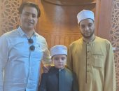 أنس مصطفى ووالده يتنافسان فى مسابقة دولة التلاوة بأسيوط