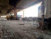 رفع مخلفات الرتش أسفل دائرى غطاطى ونفق التربيع بحى الهرم.. صور