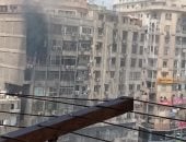 حريق داخل عمارة فى فيصل والحماية المدنية تسيطر على النيران.. فيديو وصور 
