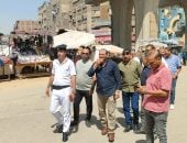 رئيس حى بولاق الدكرور يتابع الحالة العامة بمزلقان ناهيا والسلم الكهربائى