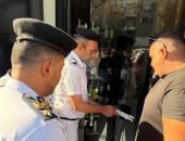 تشميع منشآت تعمل دون ترخيص خلال حملة مكبرة بحى العجوزة.. صور