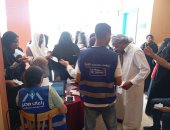 إقبال أهالى قرية الكوبانية بأسوان على الكشف الطبي المجاني بقافلة التحالف.. صور