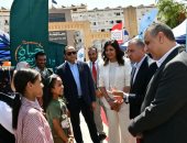 أهالي الكوبانية بأسوان يشكرون التحالف الوطنى على قافلة "إيد واحدة" وخدماتها