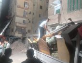 بدء نقل منقولات الأسر المتضررة من عقاري لامبروزو والمازني بالإسكندرية