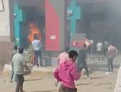 معاينة موقع حريق اشتعل داخل محطة وقود في الوراق