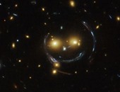 بالفيديو.. تلسكوب "هابل" يلتقط صورة لوجه مبتسم فى الفضاء الخارجى