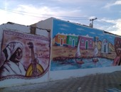 بالصور.. لوحات جرافيتى تزين الشوارع تزامنًا مع تعامد الشمس على "أبوسمبل"